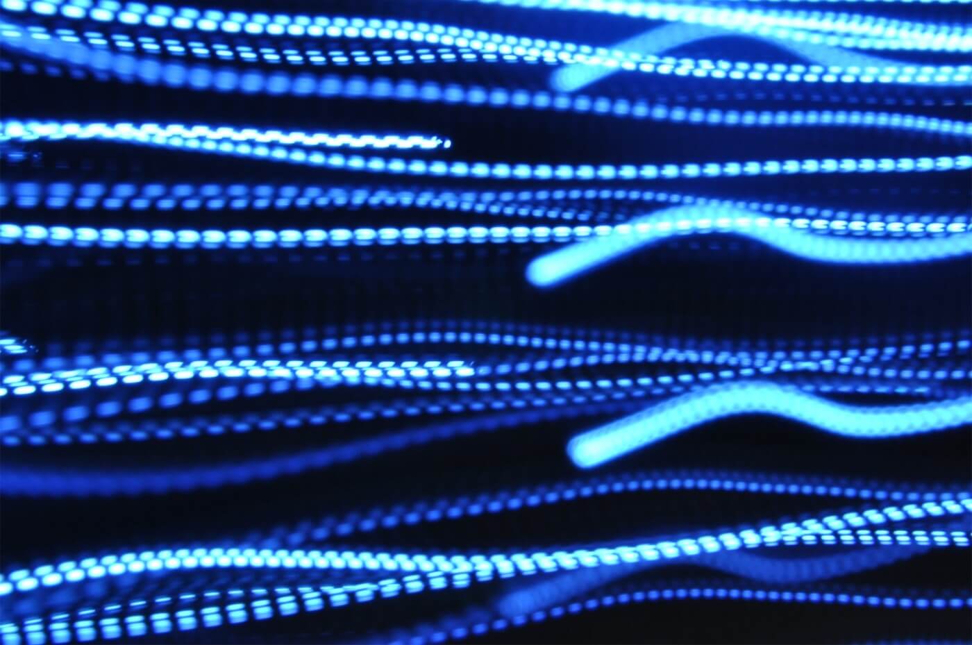 Trails of blue light
